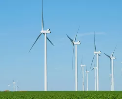 wind turbines on Colorado eastern plains shown in an agricultural crop