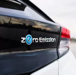 zero emission noted on the back of a black car